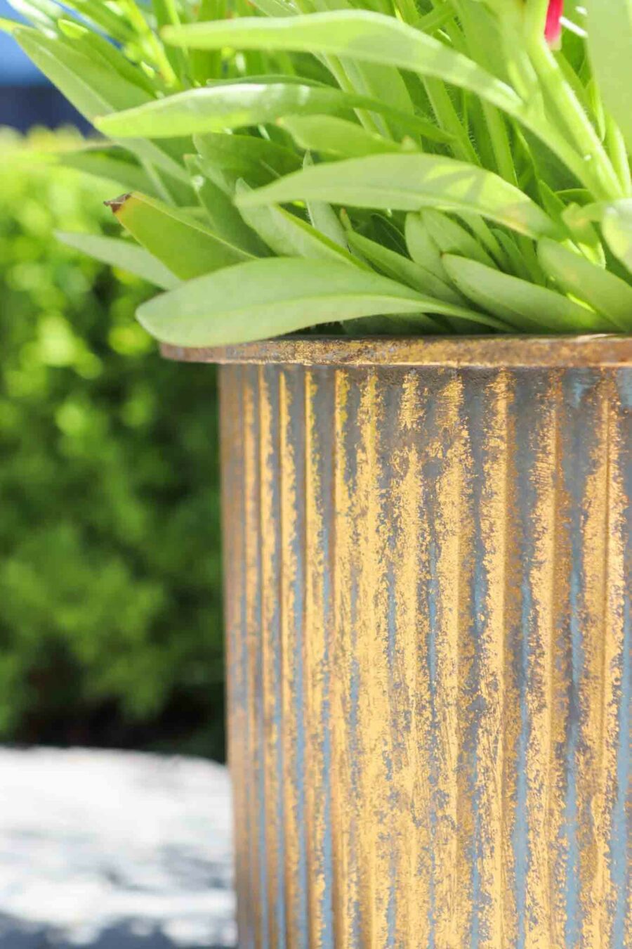 two bronze metal planters
