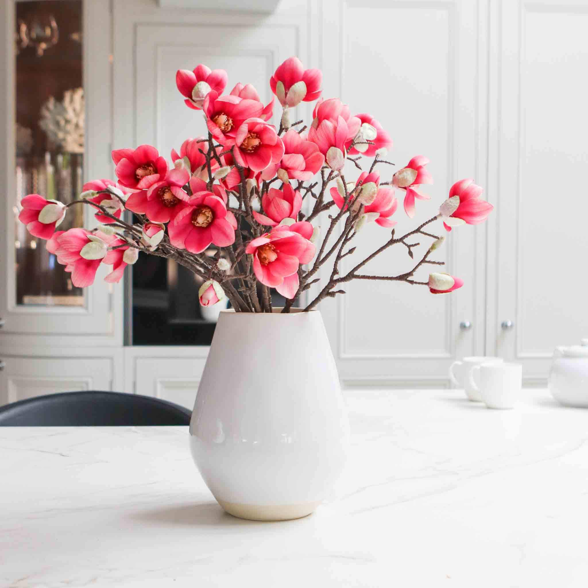 six pink faux magnolia branches
