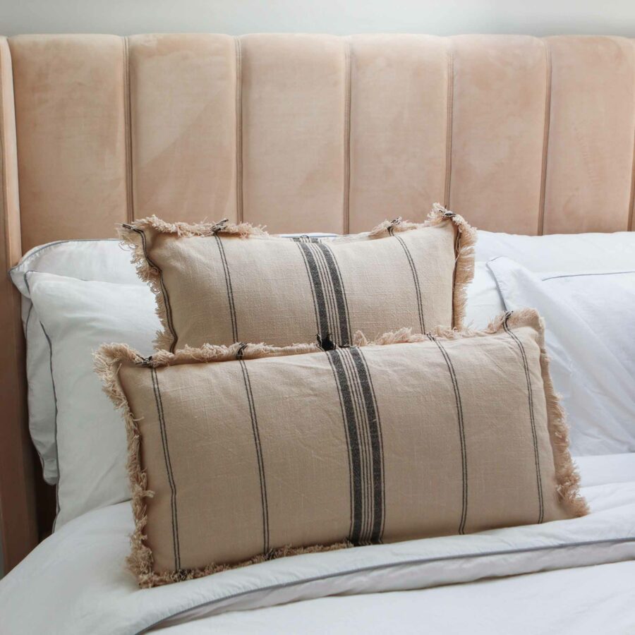 beige striped fringe cushion
