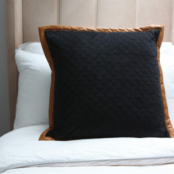 black velvet quilted cushion