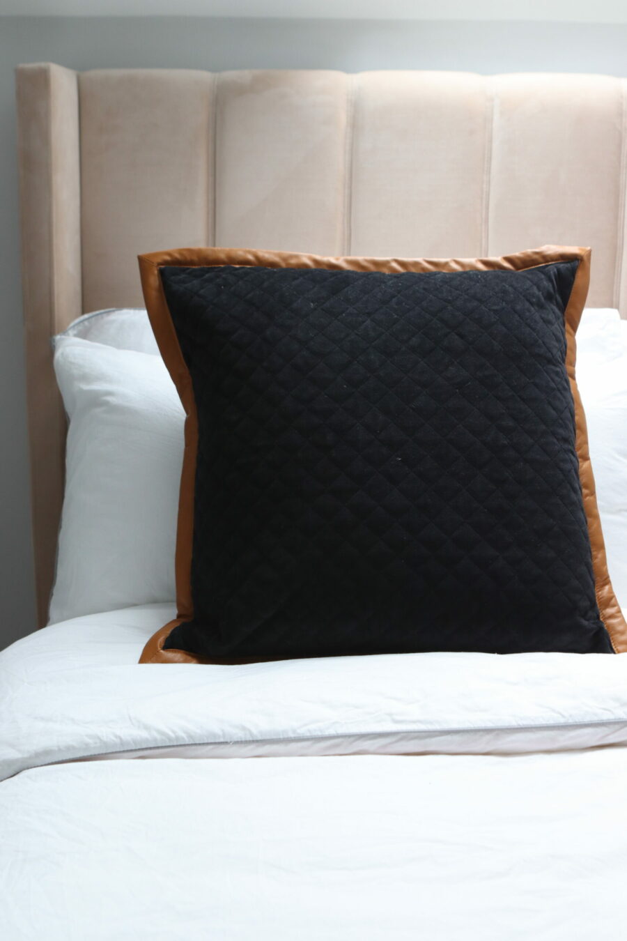 black velvet quilted cushion