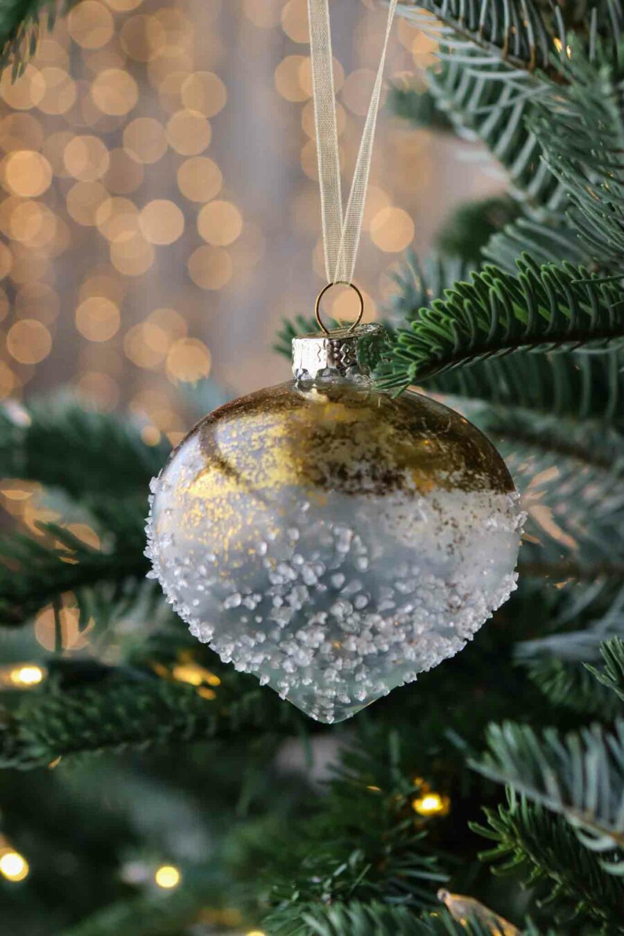 three assorted gold and frost glass baubles