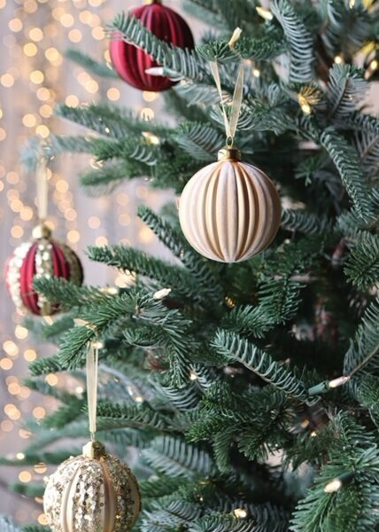 eight assorted red and gold sequin glass baubles