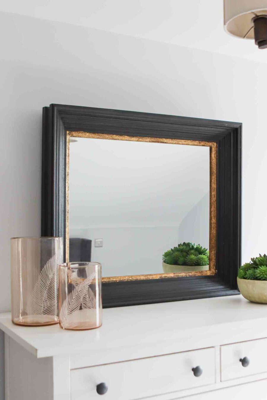 black & gold flat rectangular mirror