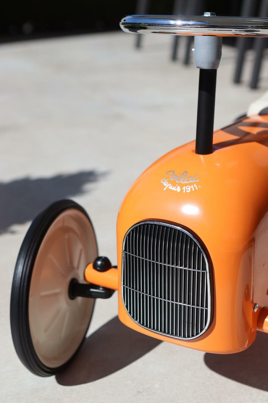 classic vintage ride on car in orange