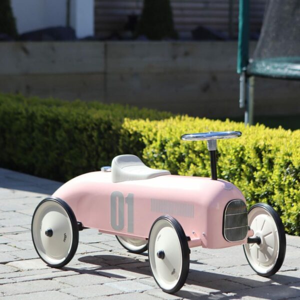 classic vintage ride on car in pink