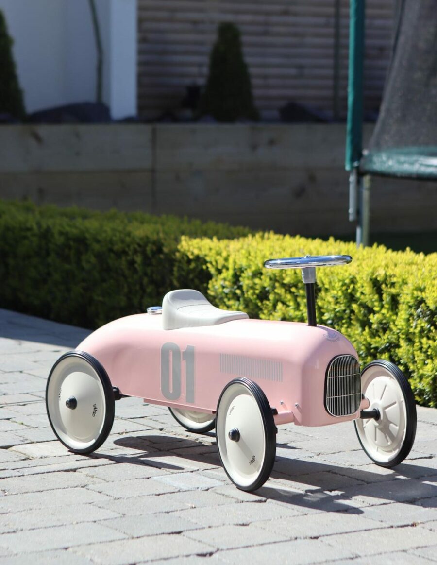 classic vintage ride on car in pink